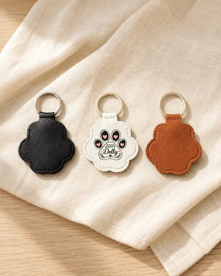 Finished Dolly paw-shaped memorial keyrings