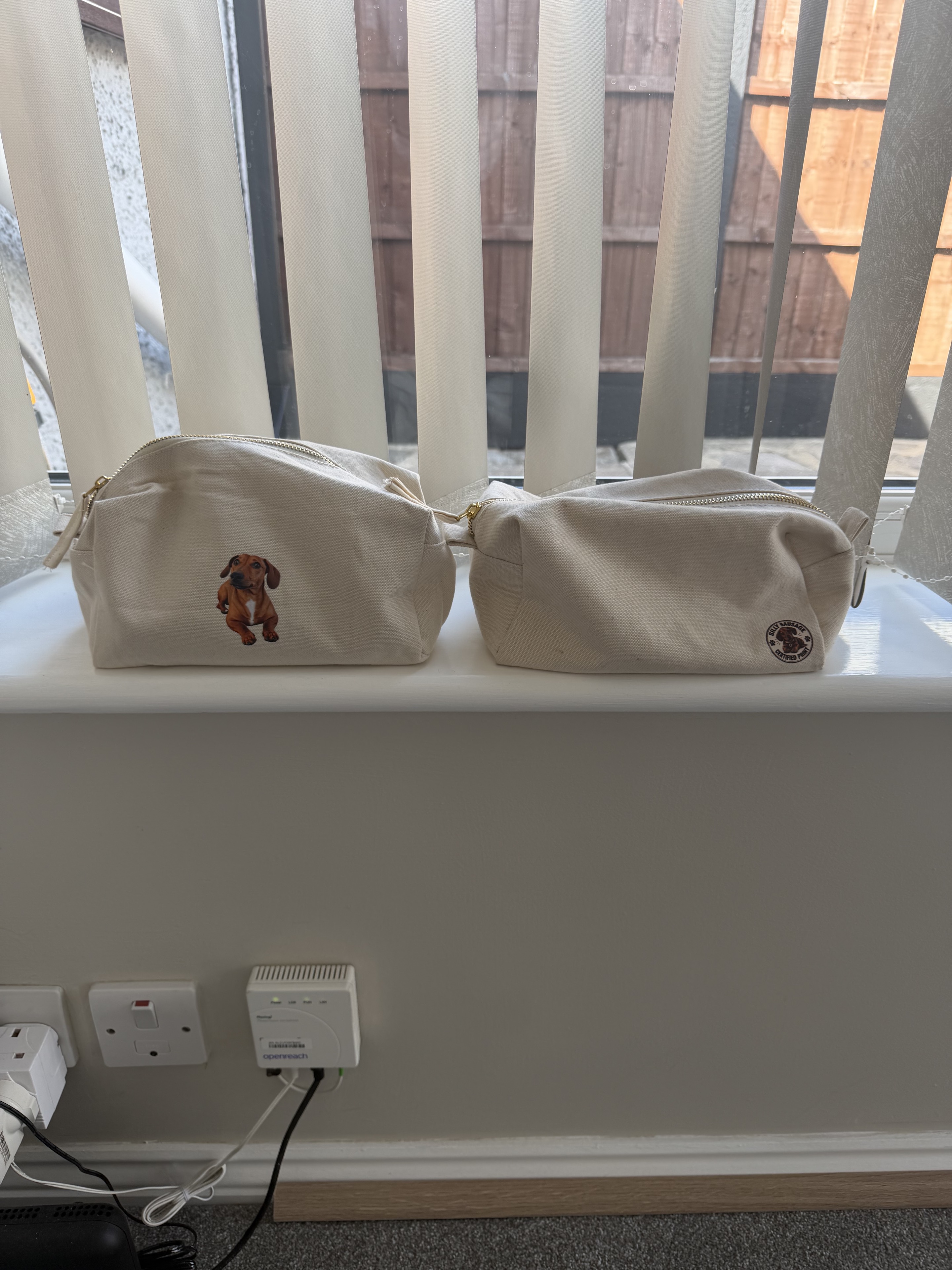 Two real personalised dachshund portrait pouches
